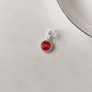 Berloque tampa de coca